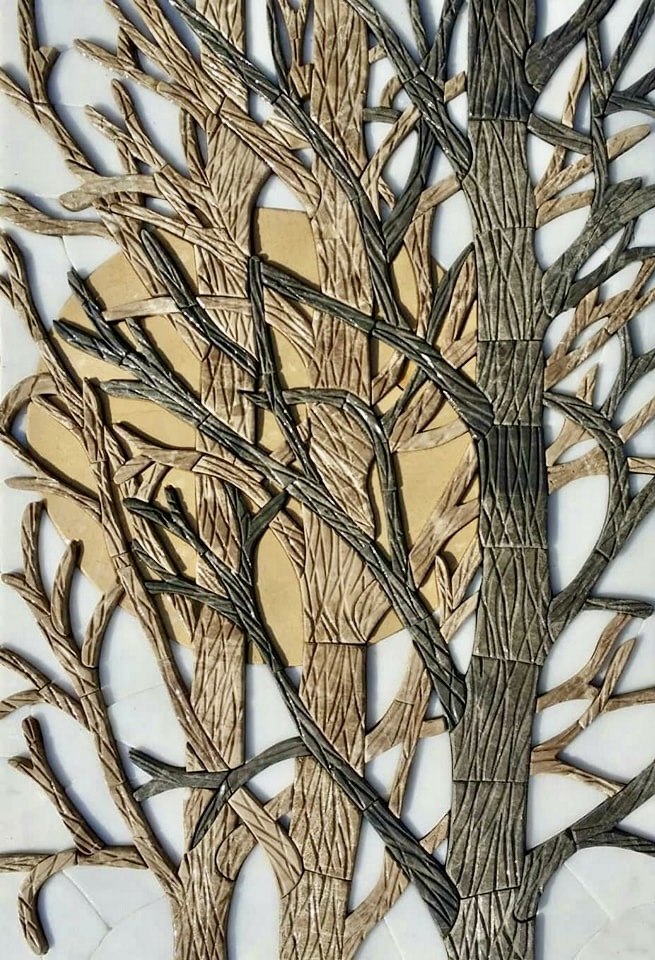 Sculptural stone branches layered over a golden sun and a pale stone mosaic background.